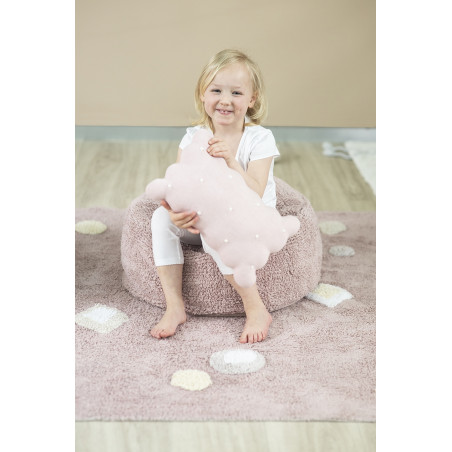 Vieux pouf rose pour enfants