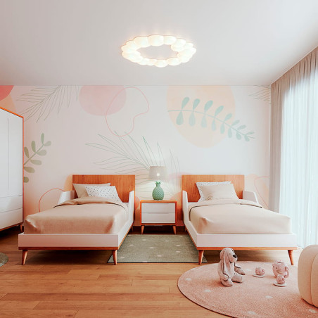 Papier peint rose et jaune pour chambre de filles avec des fleurs abstraites