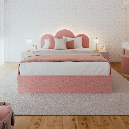 Cama tapizada rosa con cabecero nube
